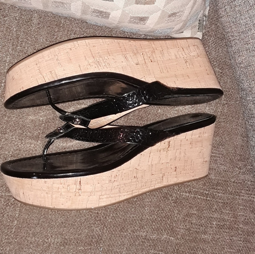 Black patent leather coach wedges